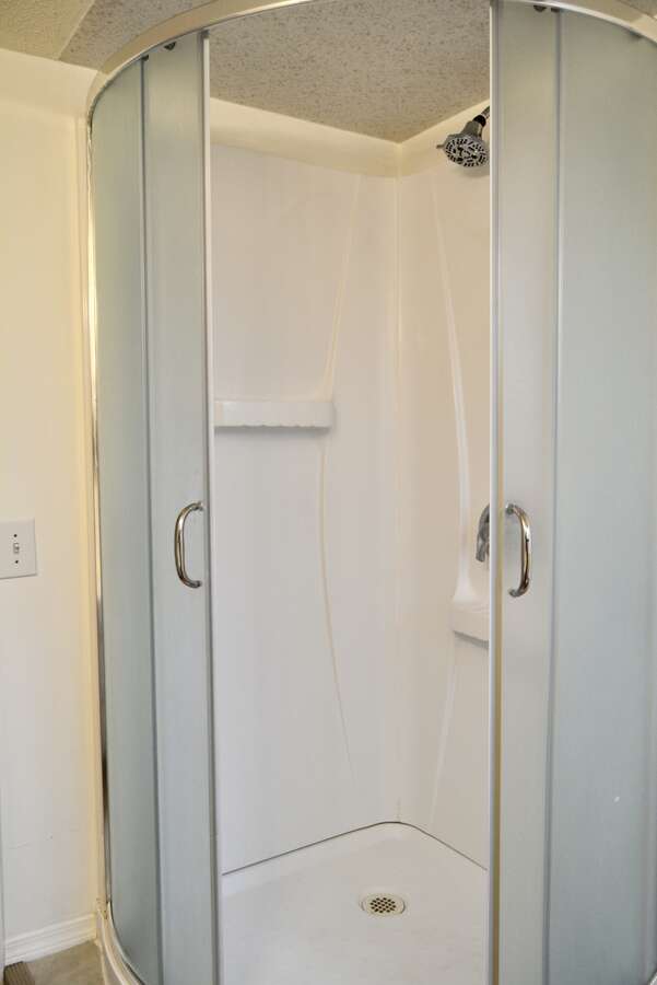3 piece bath showing shower - lower level