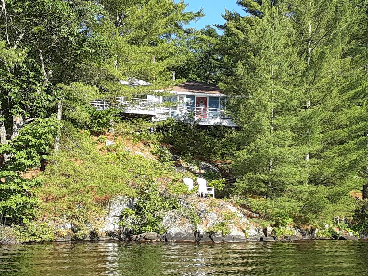 view of cottage from the water
