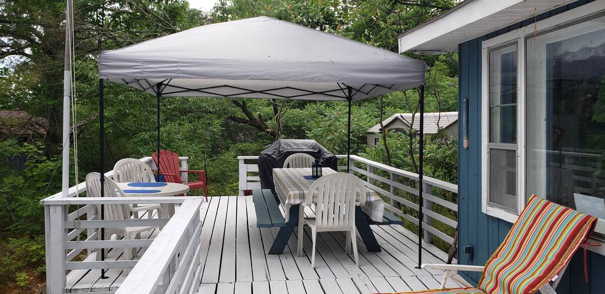 canopied deck, bunkie in the background