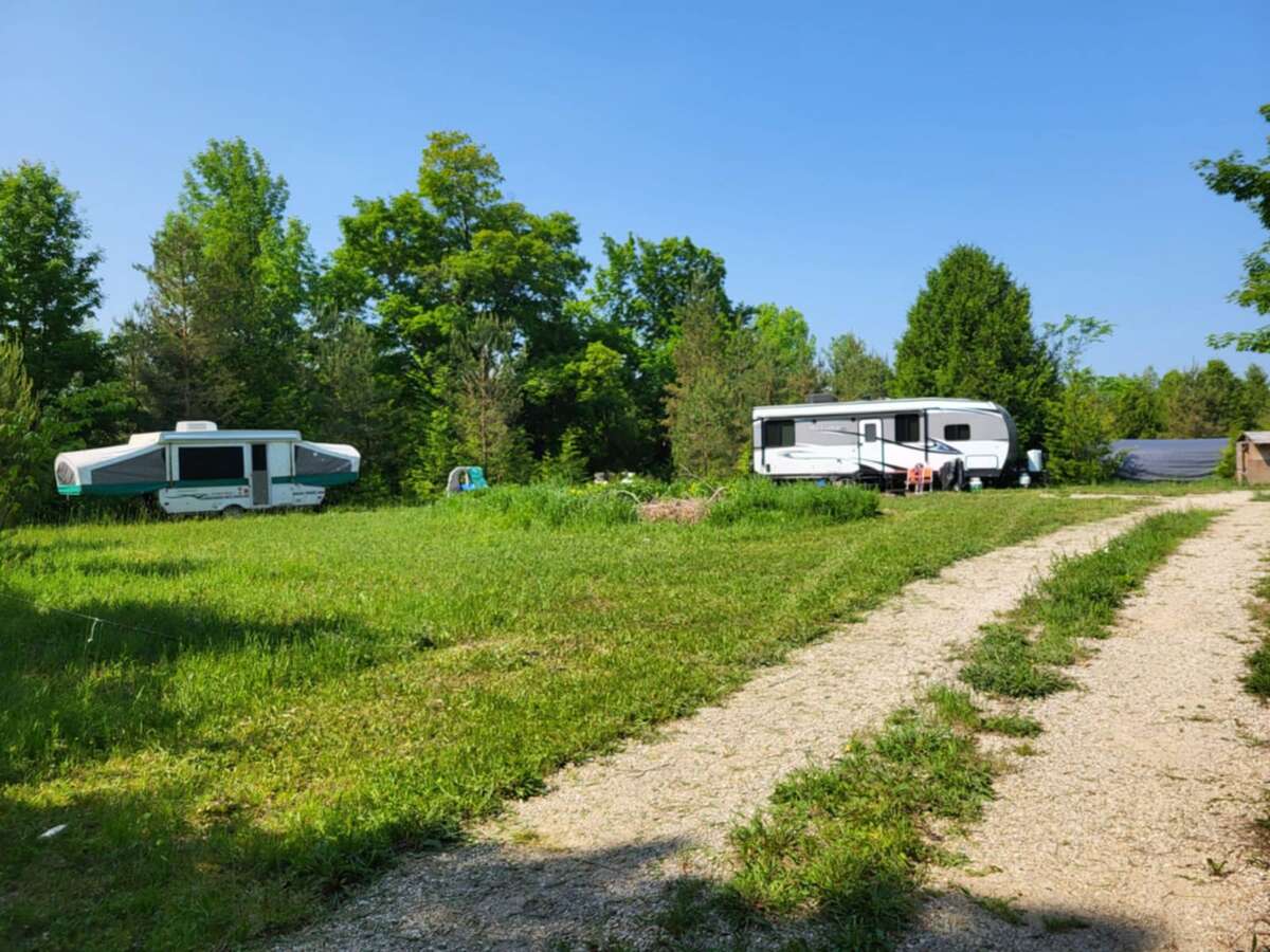 Lots of room for multiple trailers and future building site.