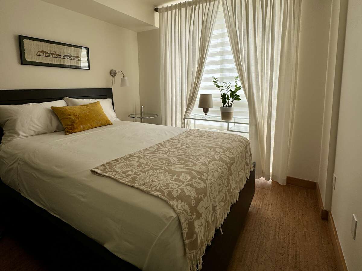 Smooth ceilings throughout suite.