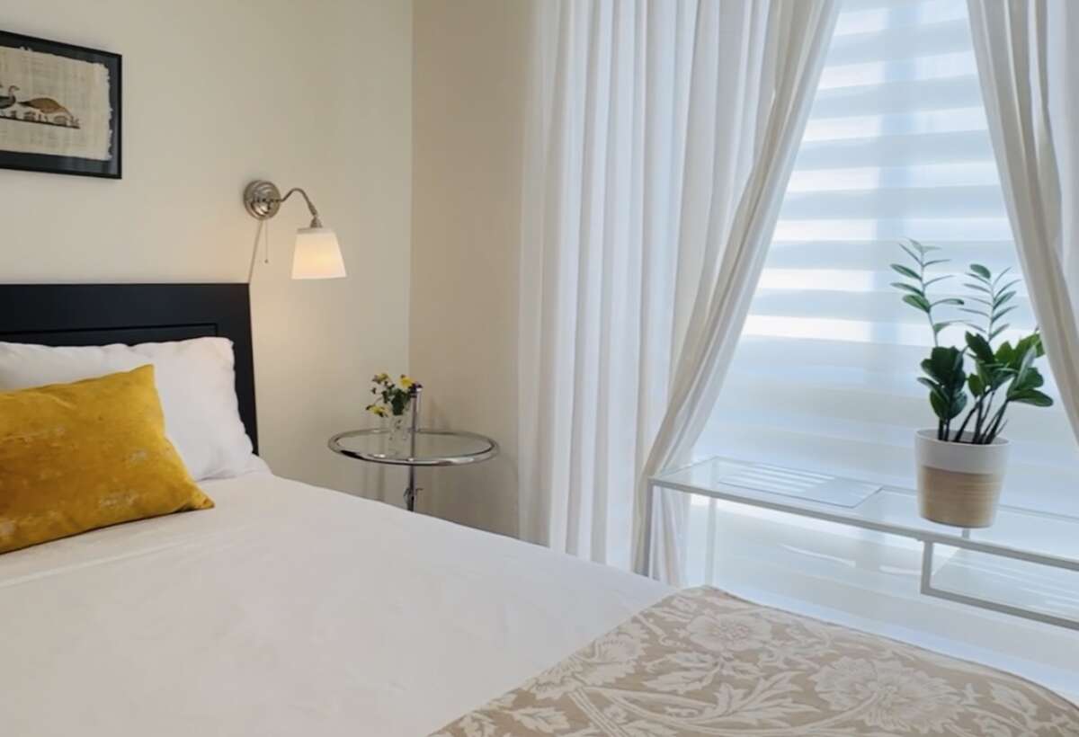 Smooth ceilings throughout suite.