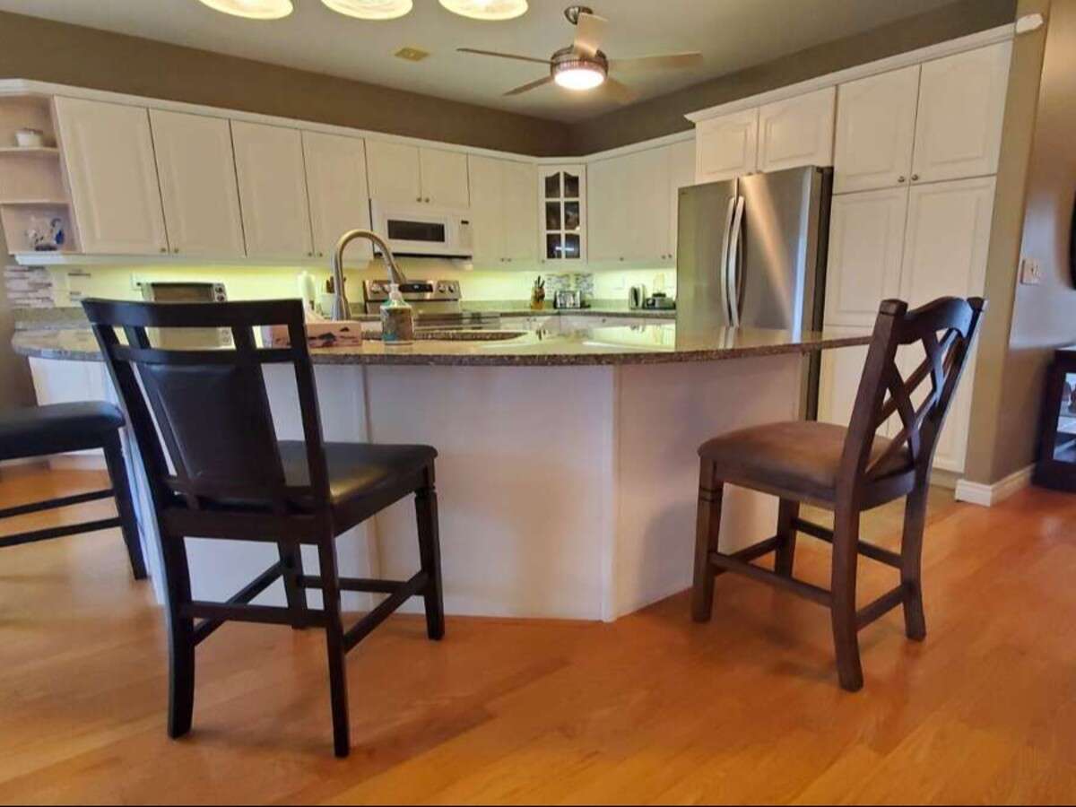 Privacy, Lake Views, & 3,000 sqft. Refined Living!