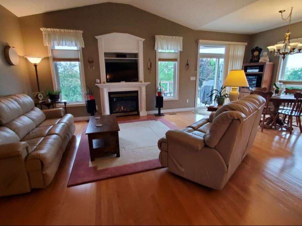 Privacy, Lake Views, & 3,000 sqft. Refined Living!
