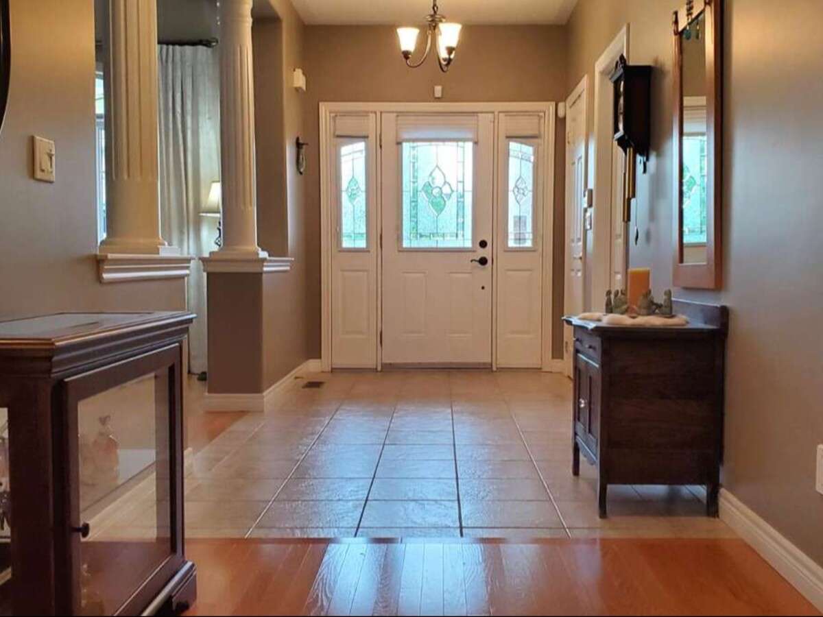 Privacy, Lake Views, & 3,000 sqft. Refined Living!