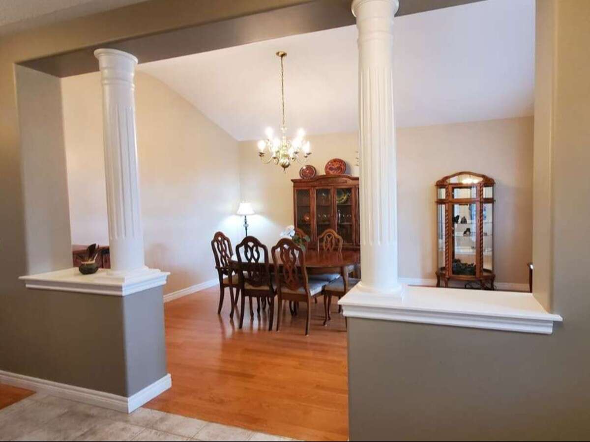 Privacy, Lake Views, & 3,000 sqft. Refined Living!