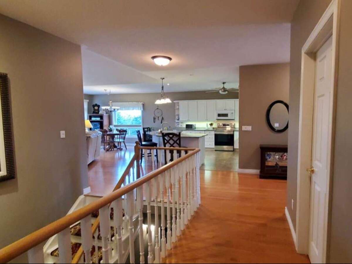 Privacy, Lake Views, & 3,000 sqft. Refined Living!