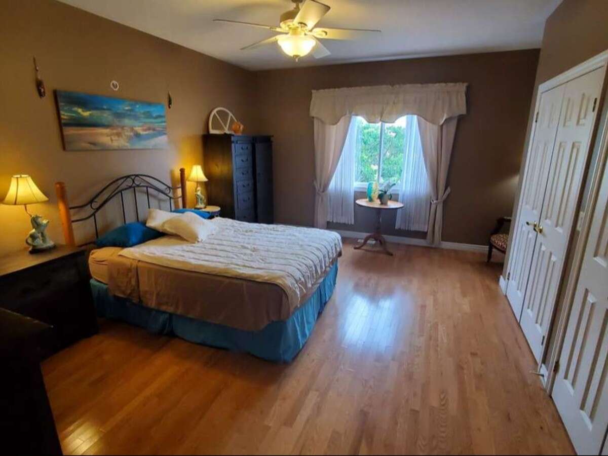 Privacy, Lake Views, & 3,000 sqft. Refined Living!