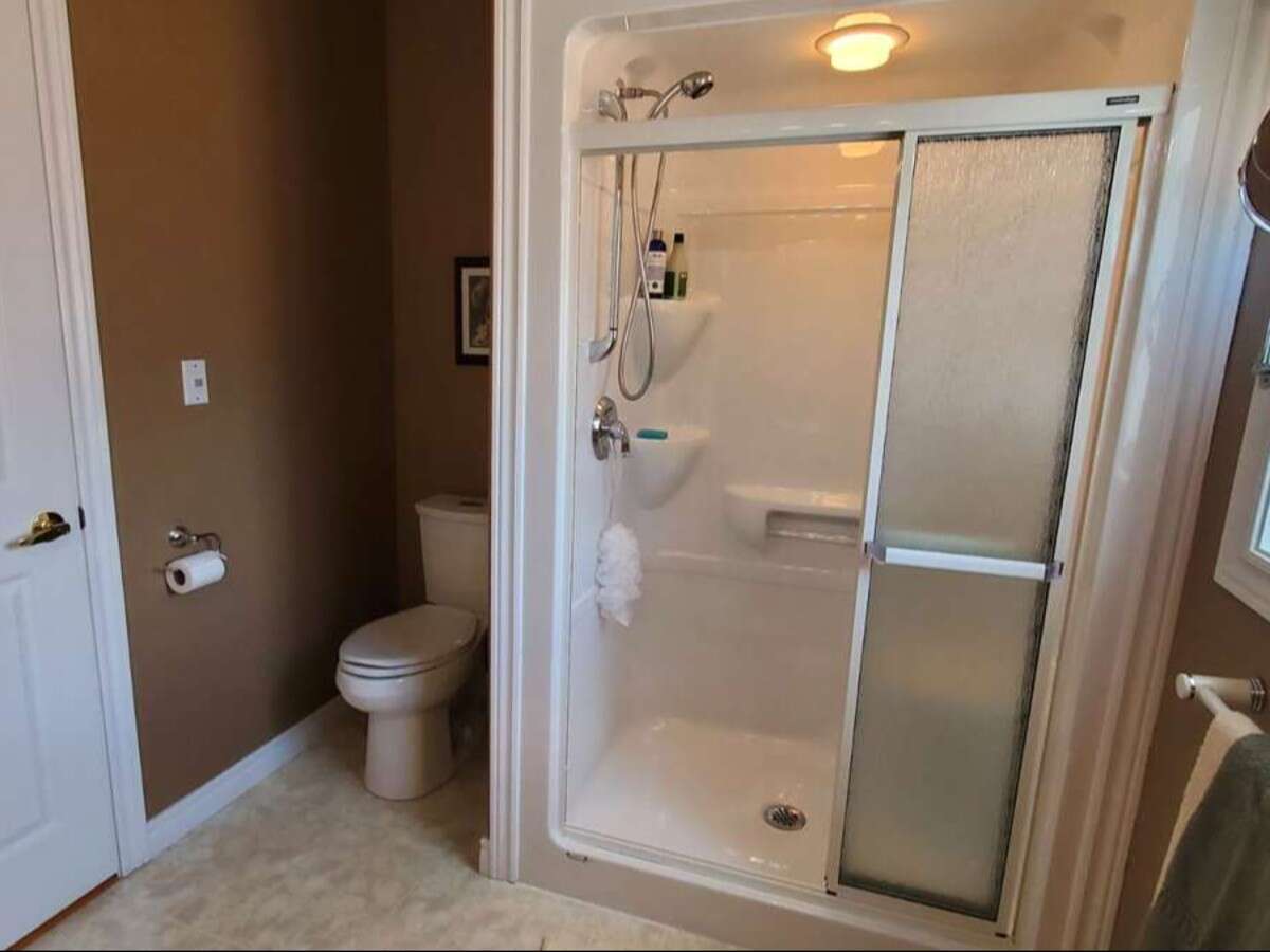 Privacy, Lake Views, & 3,000 sqft. Refined Living!
