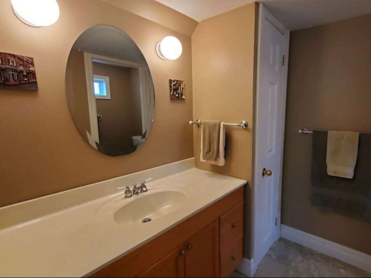 Privacy, Lake Views, & 3,000 sqft. Refined Living!
