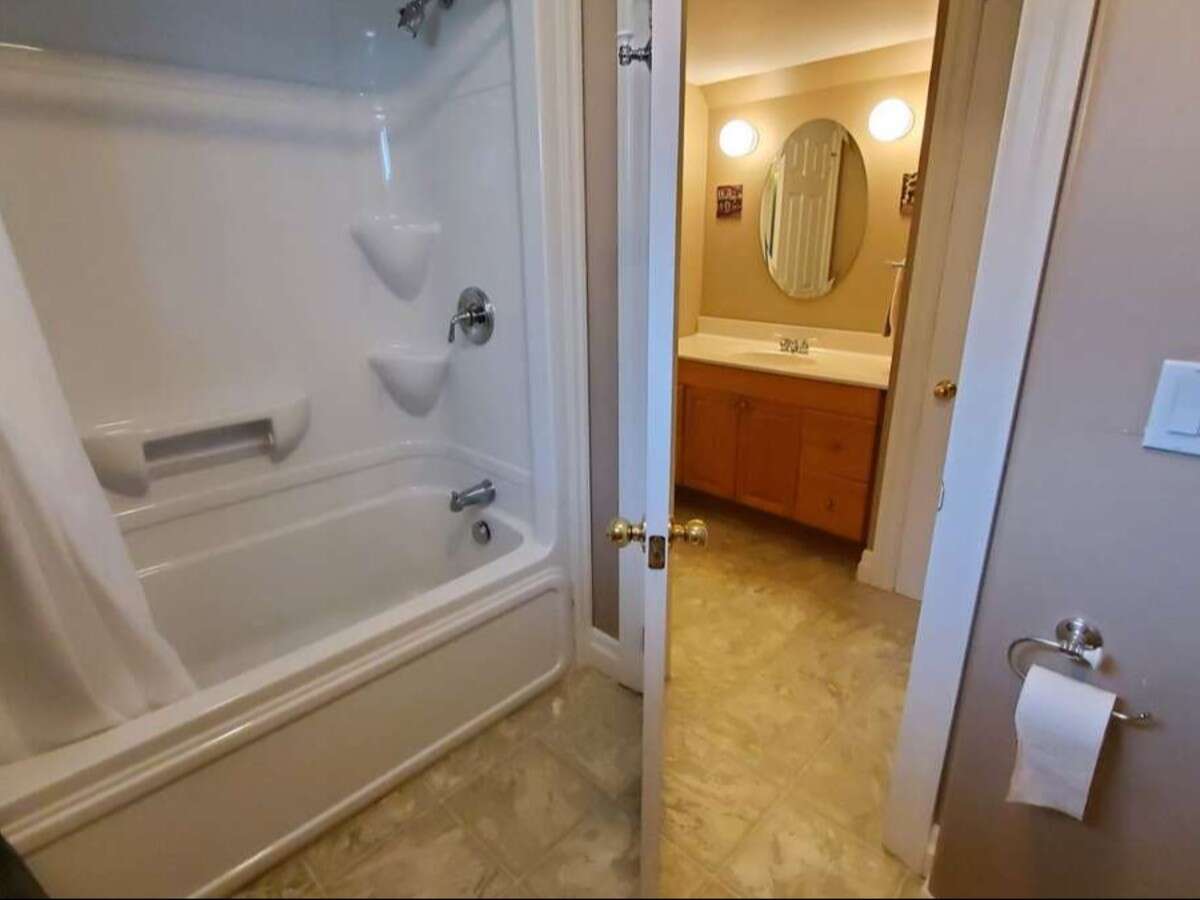 Privacy, Lake Views, & 3,000 sqft. Refined Living!