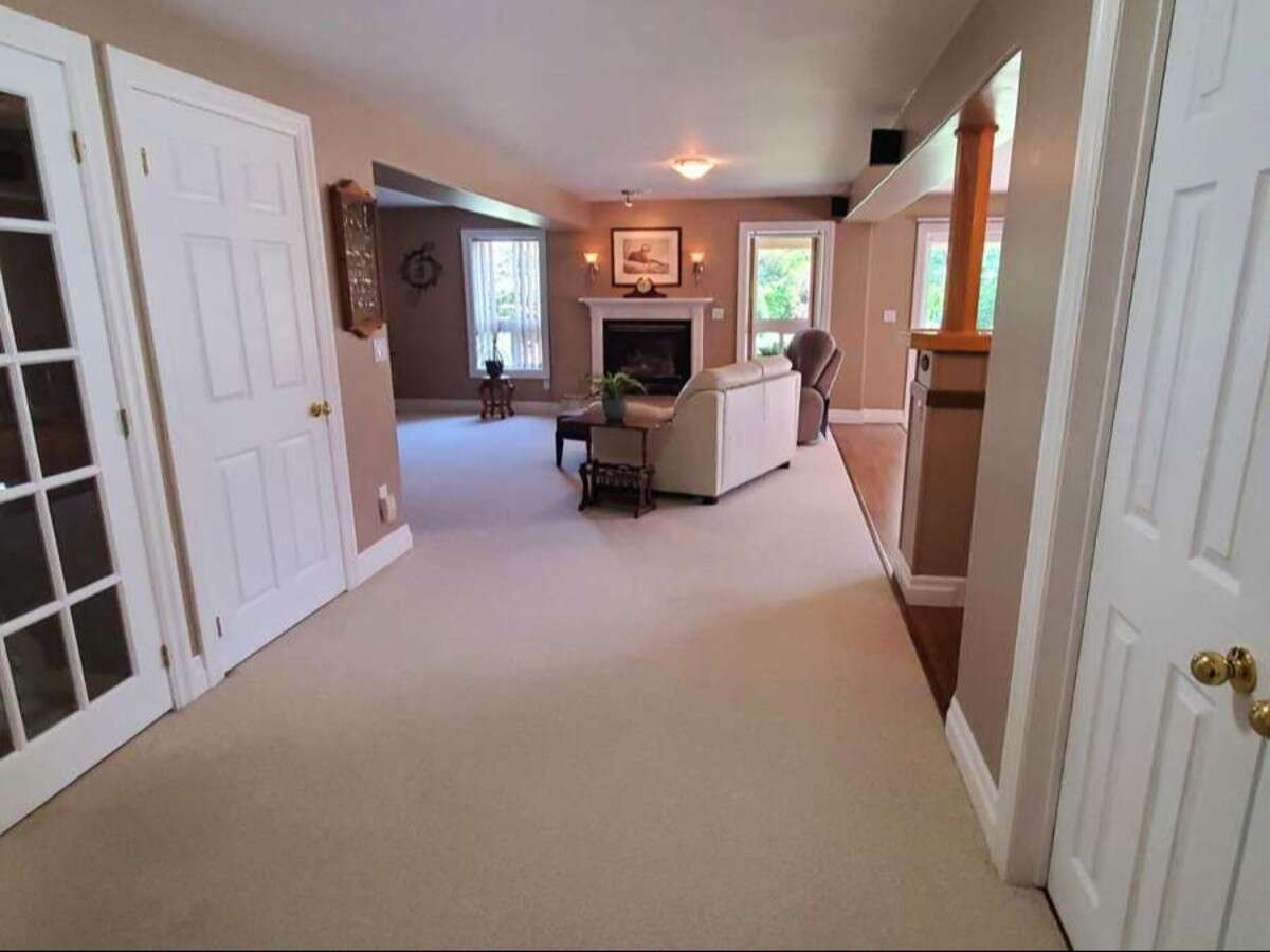Privacy, Lake Views, & 3,000 sqft. Refined Living!