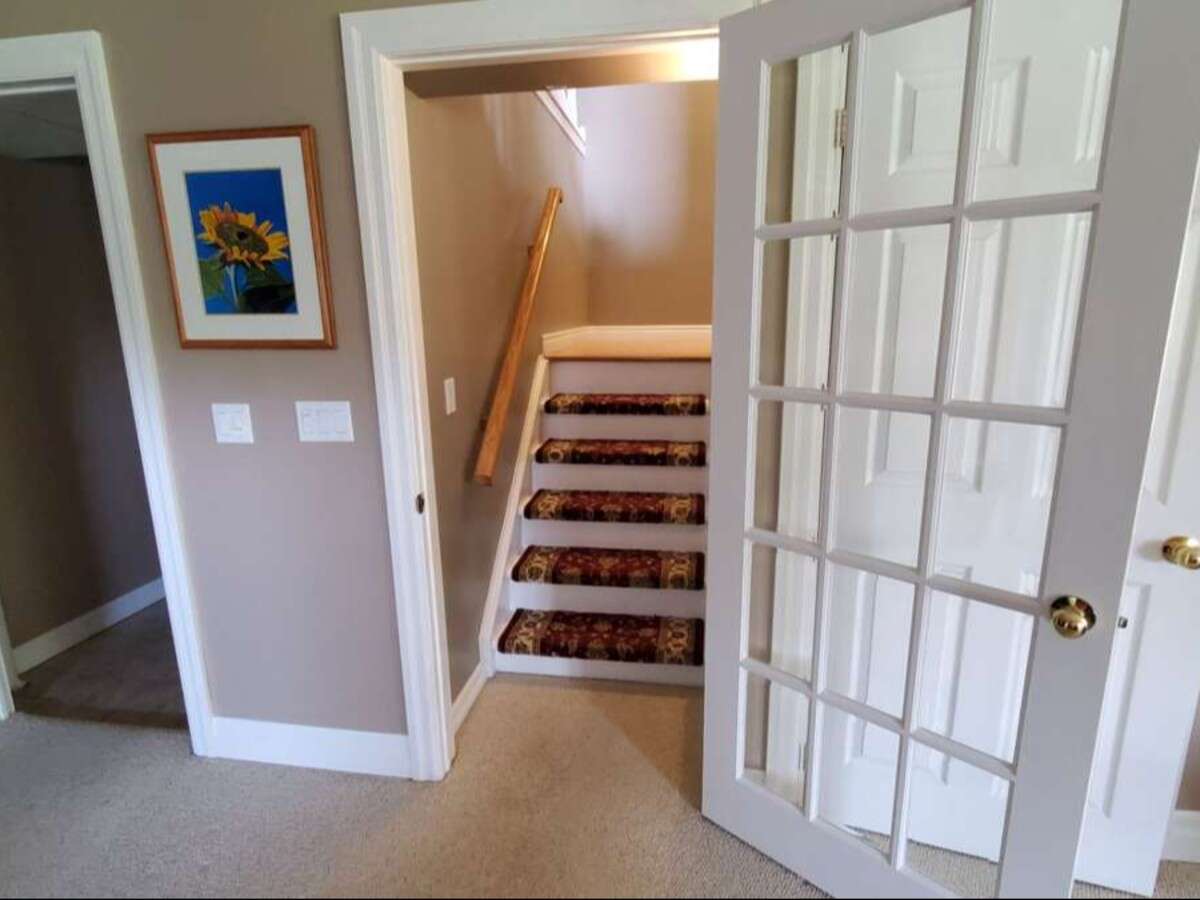 Privacy, Lake Views, & 3,000 sqft. Refined Living!