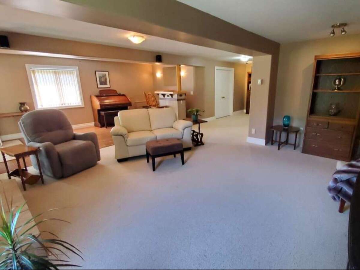 Privacy, Lake Views, & 3,000 sqft. Refined Living!