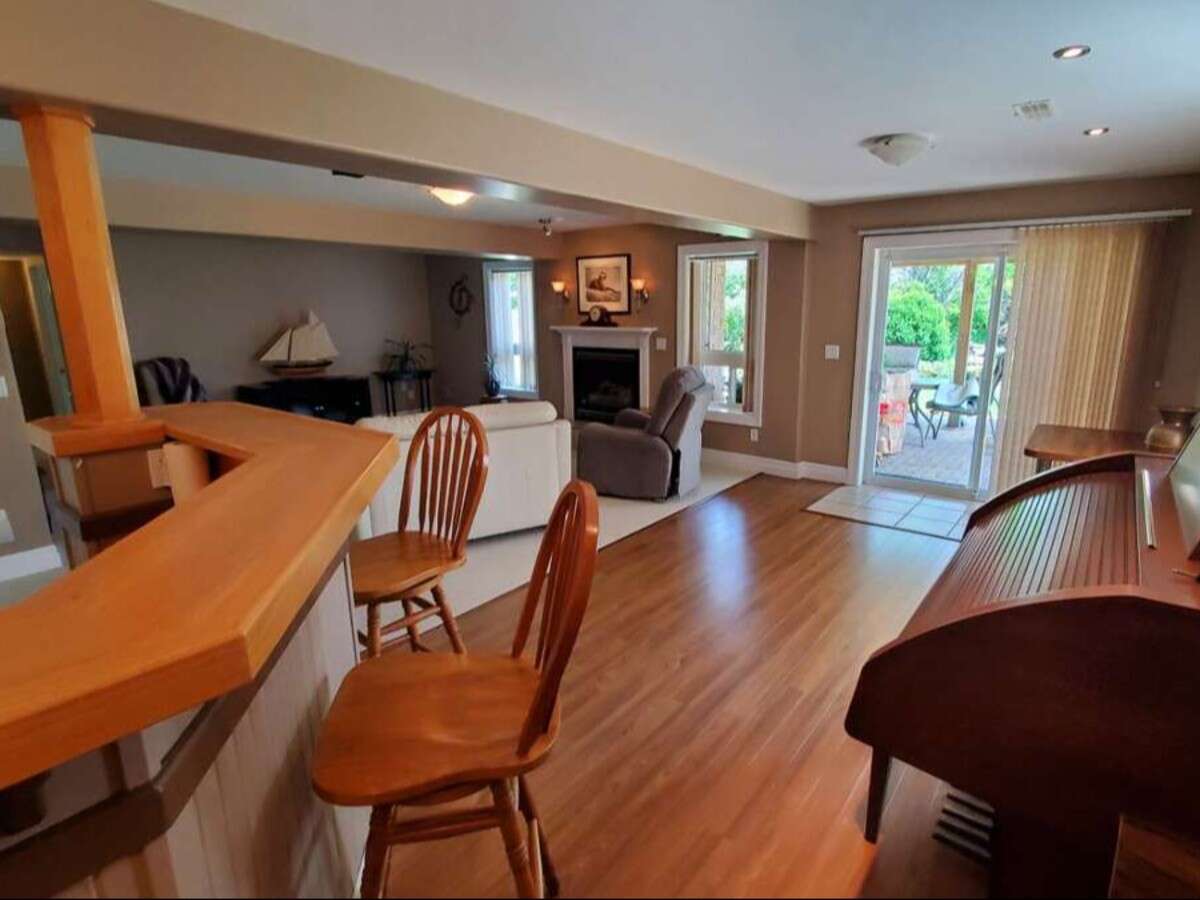 Privacy, Lake Views, & 3,000 sqft. Refined Living!