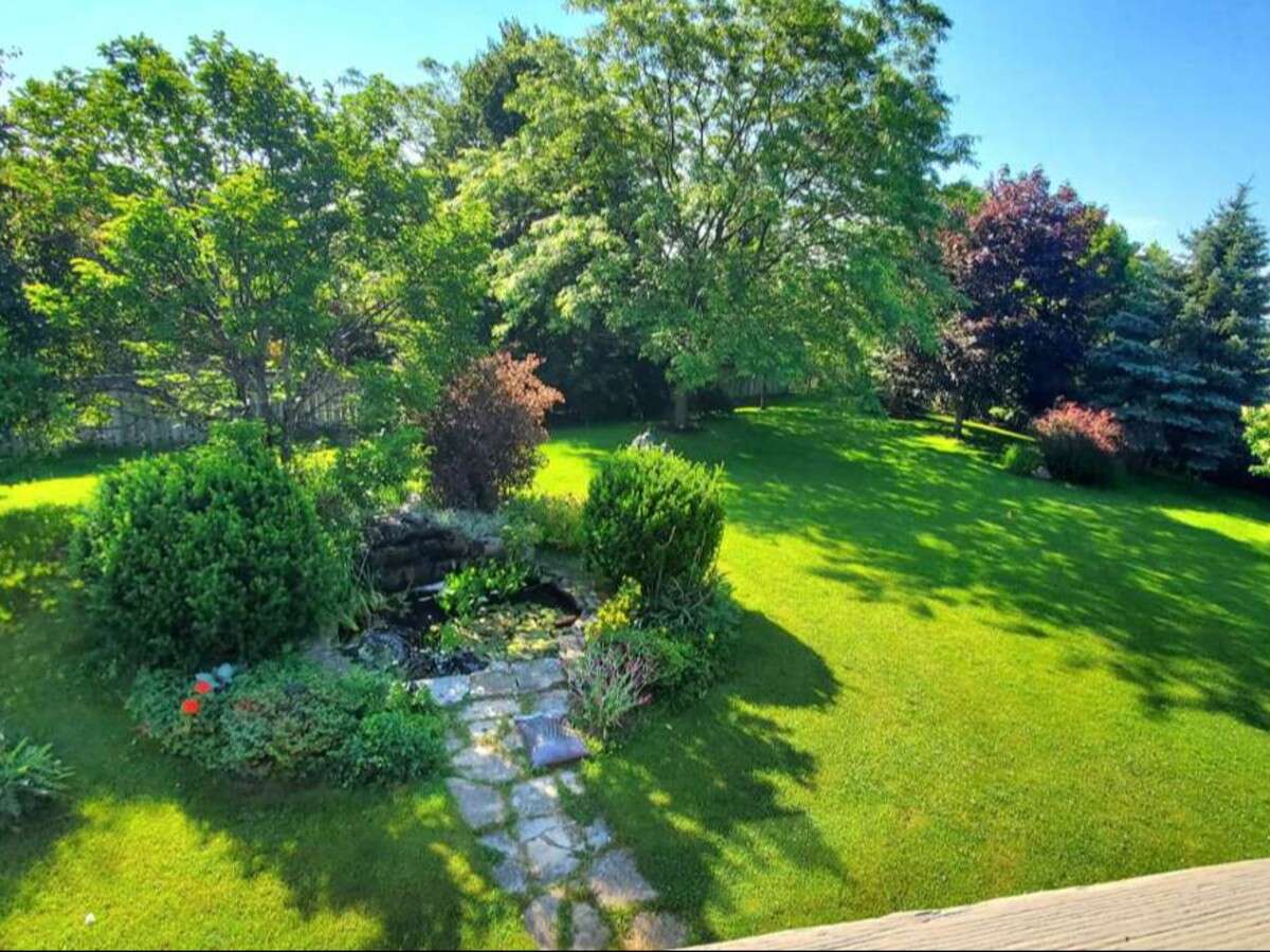 Privacy, Lake Views, & 3,000 sqft. Refined Living!