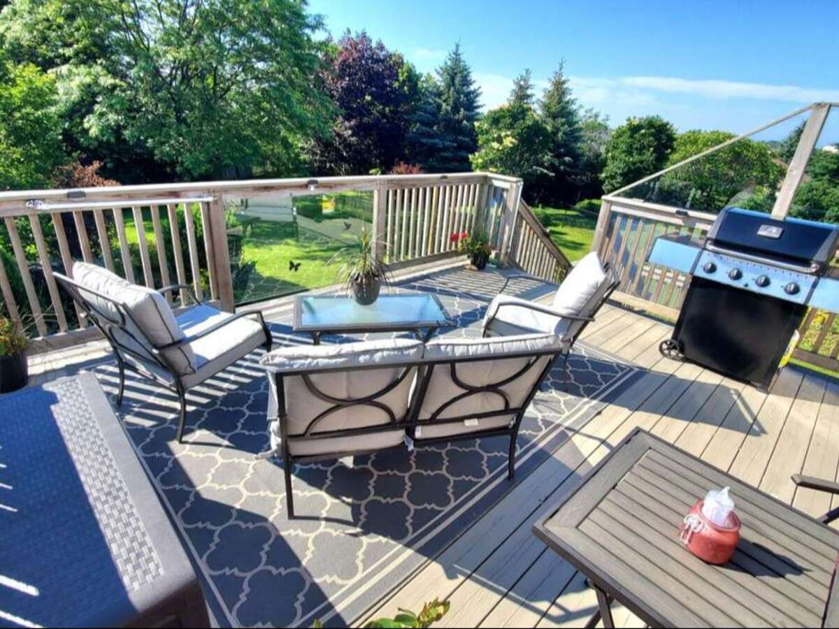 Privacy, Lake Views, & 3,000 sqft. Refined Living!