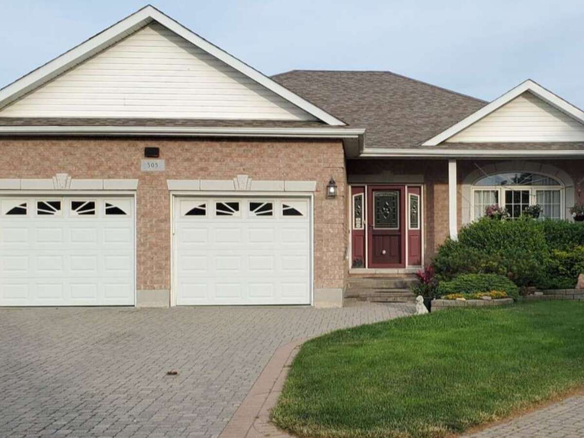 Privacy, Lake Views, & 3,000 sqft. Refined Living!