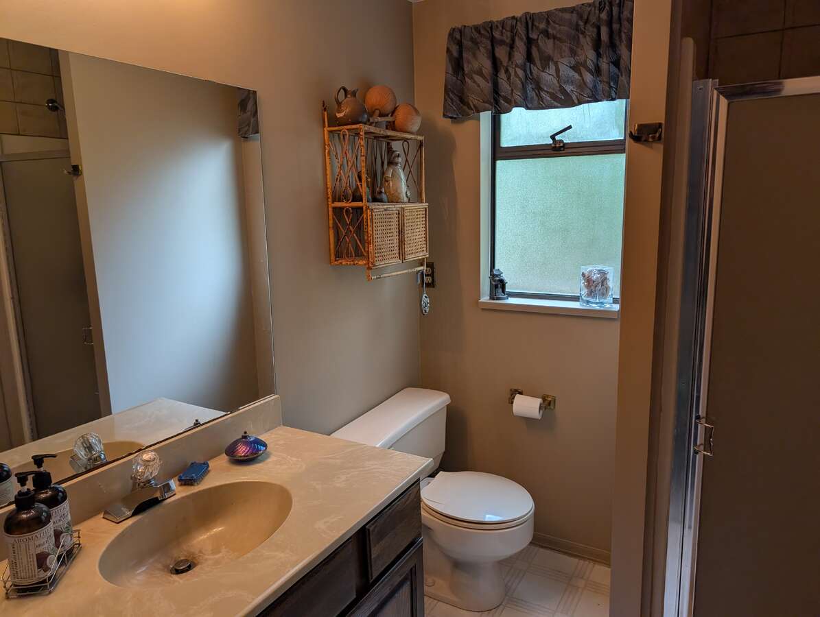 Bathroom with Shower across from Sauna