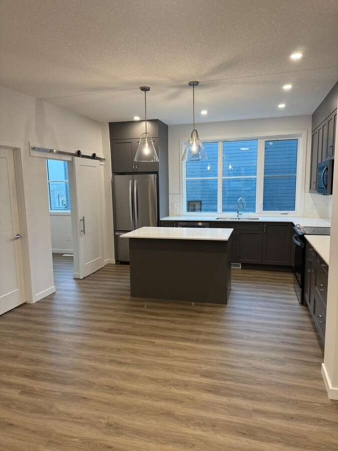Main Floor Den  off Kitchen