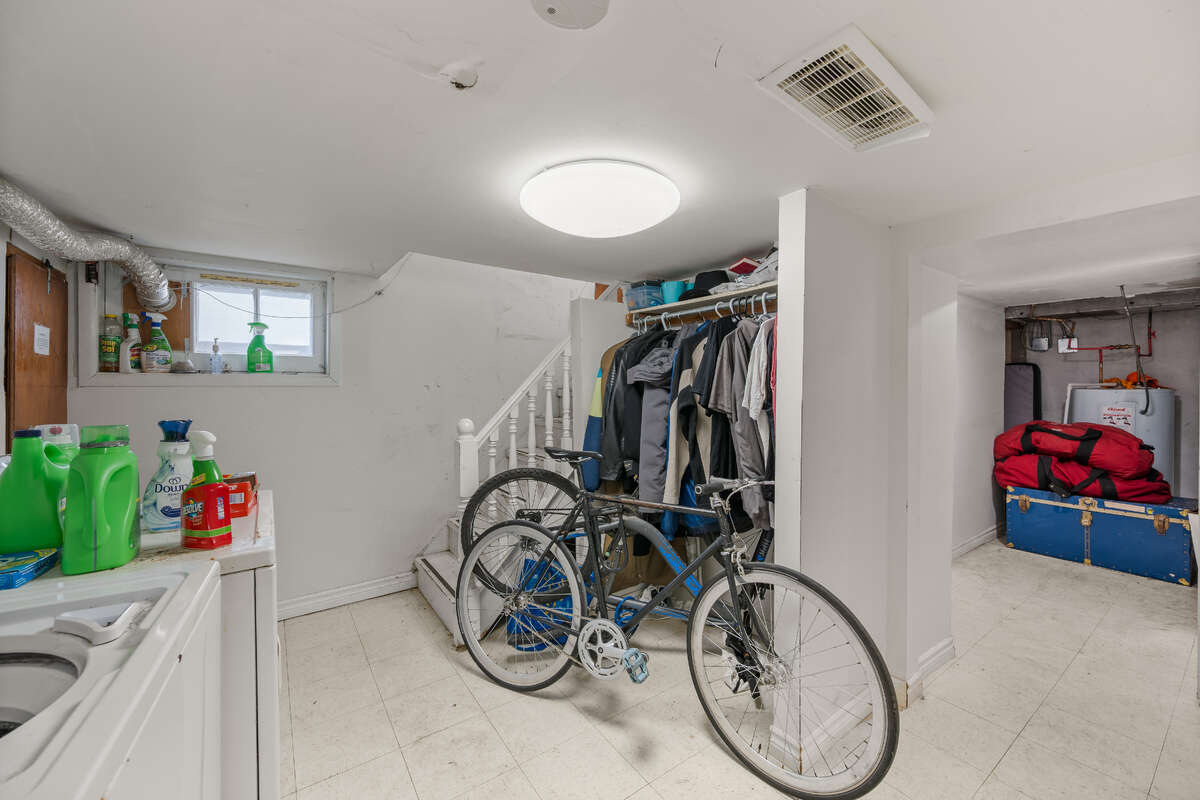 Stairs to finished basement area (and utility room)