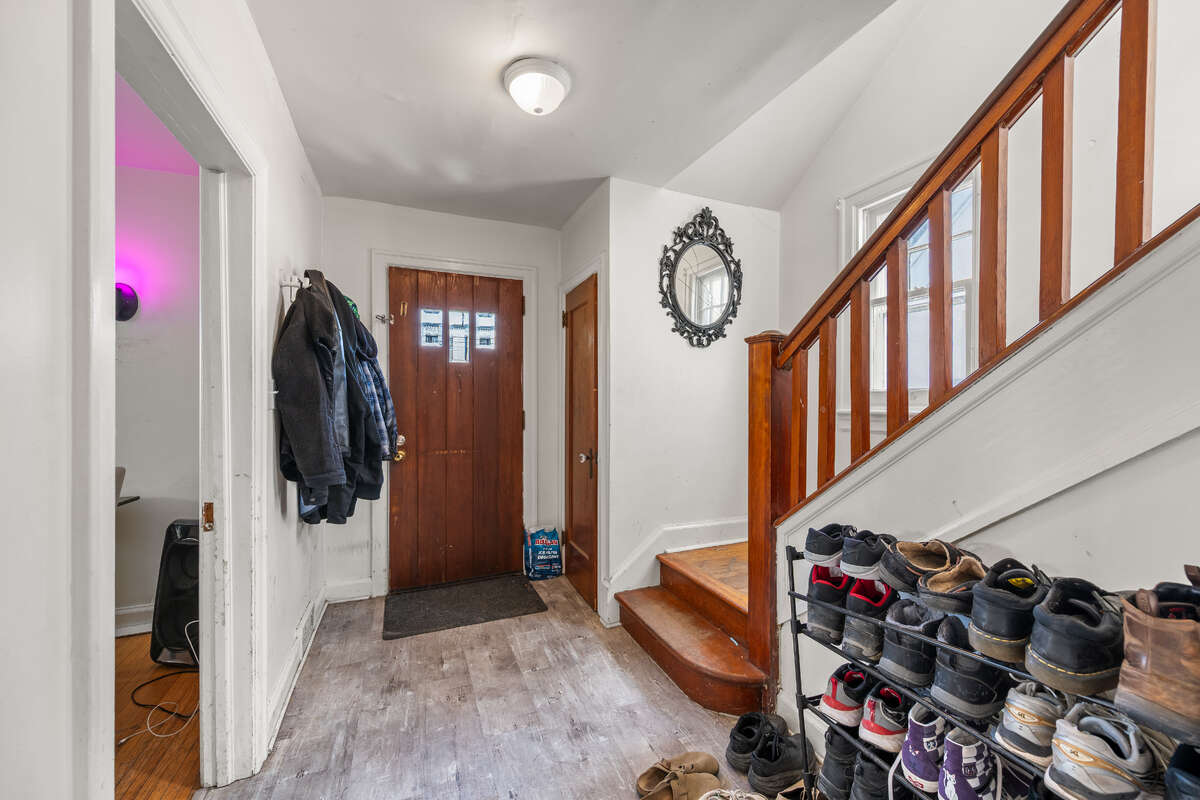 Front door showing WC and stairway leading up to second floor