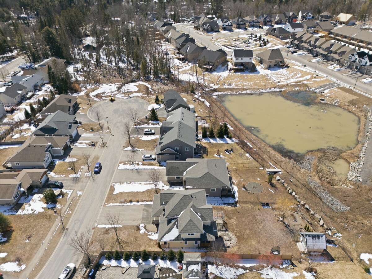 Three raised bed and corner perennial pollinator garden