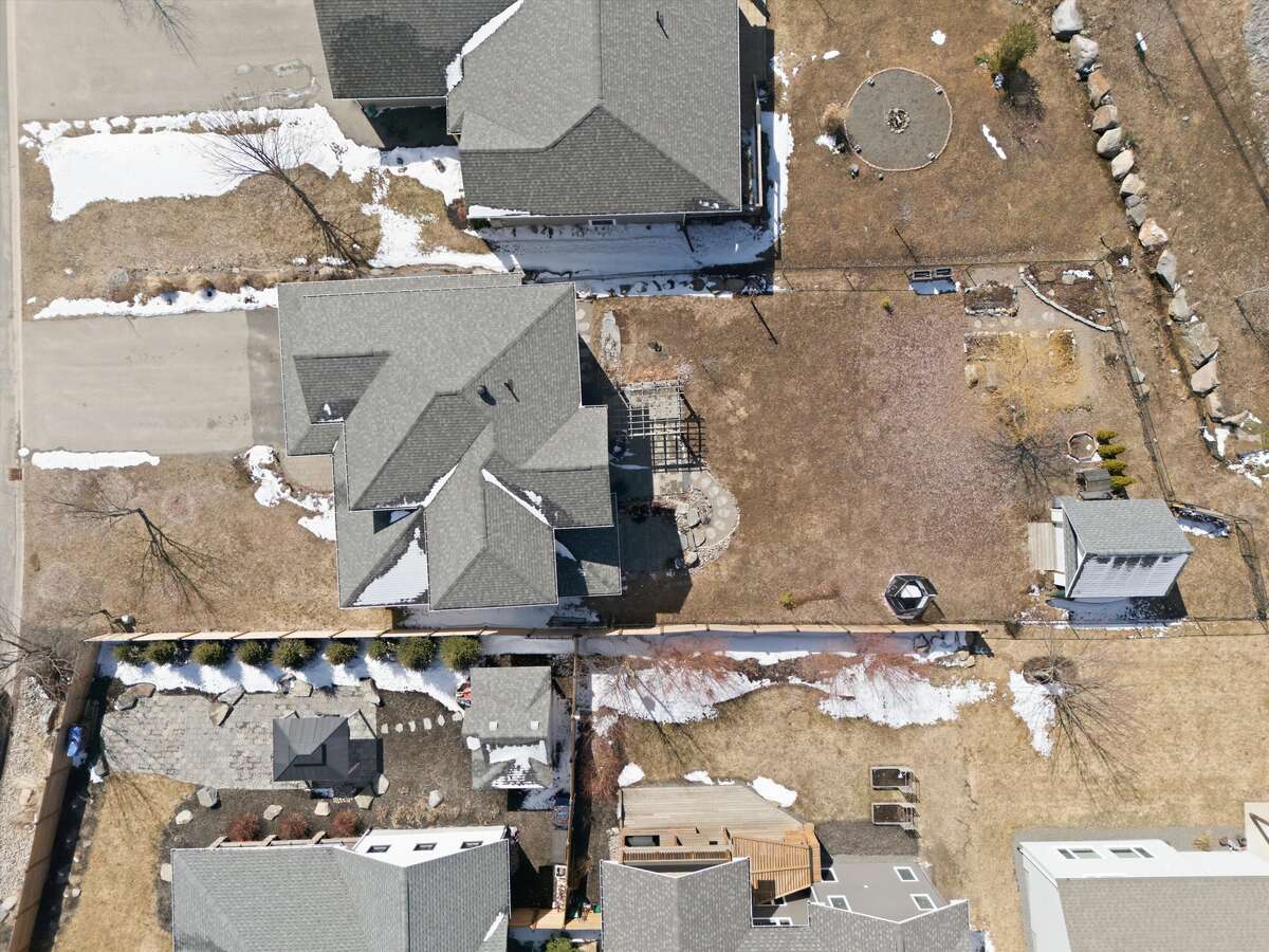 Three raised bed and corner perennial pollinator garden