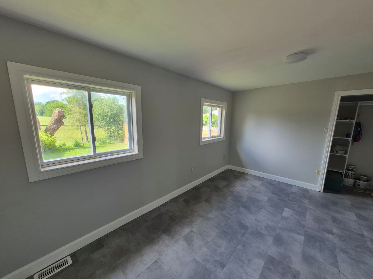 Two-story home backing onto park land