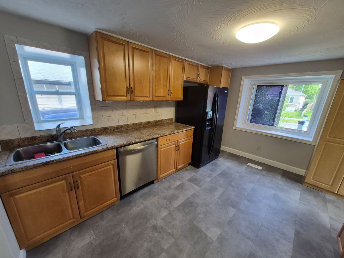 Two-story home backing onto park land