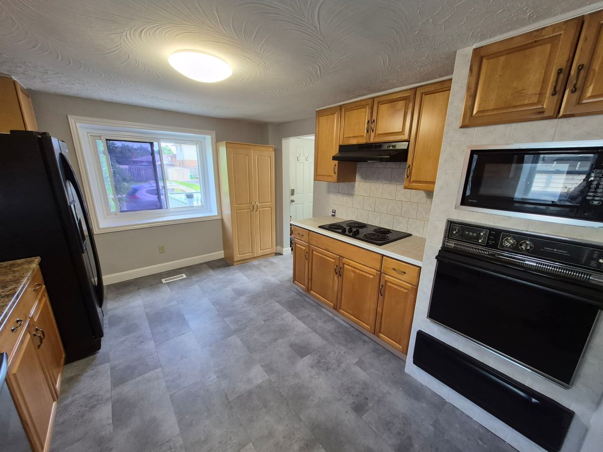 Two-story home backing onto park land
