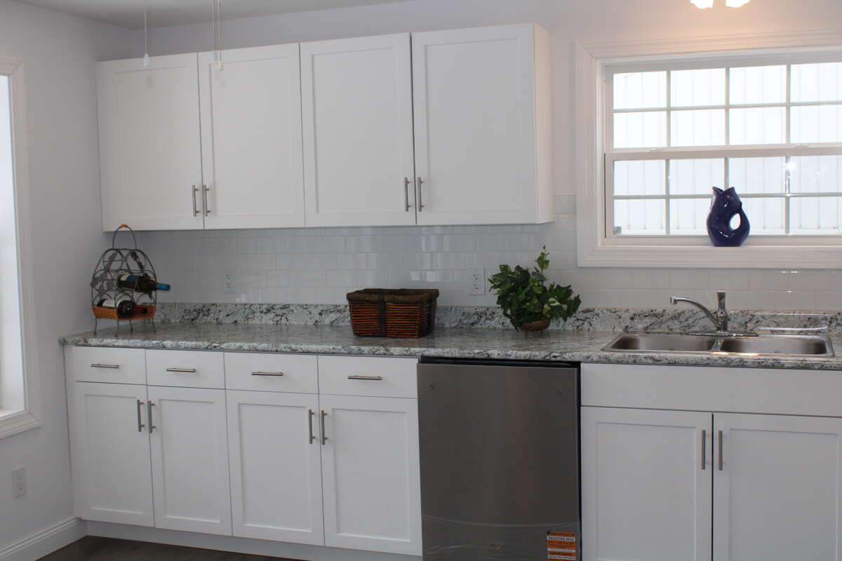 Includes a Whirlpool smooth top electric range, and French door Fridge with bottom freezer