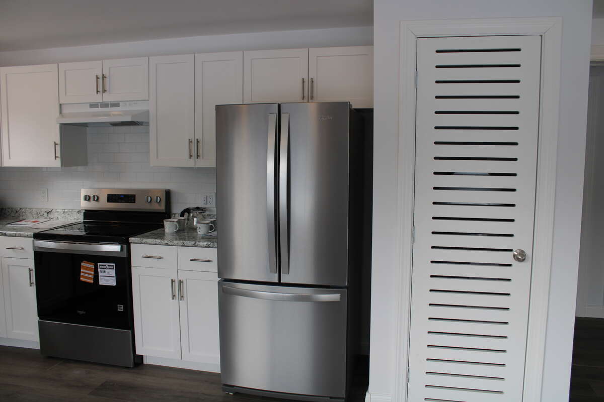 Includes a Whirlpool smooth top electric range, and French door Fridge with bottom freezer