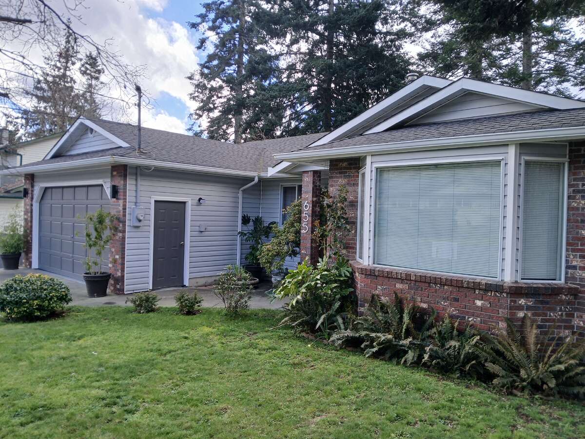 Living room (right) & 2 car garage (left)