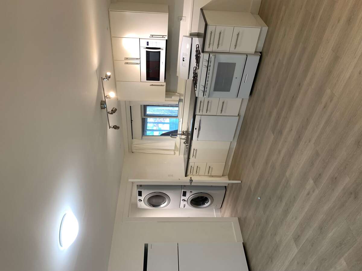 Lower level kitchen and laundry.