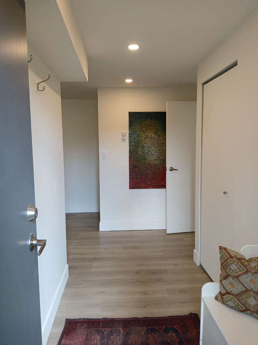 Looking into the lower level entry hall to the 2 bedroom suite