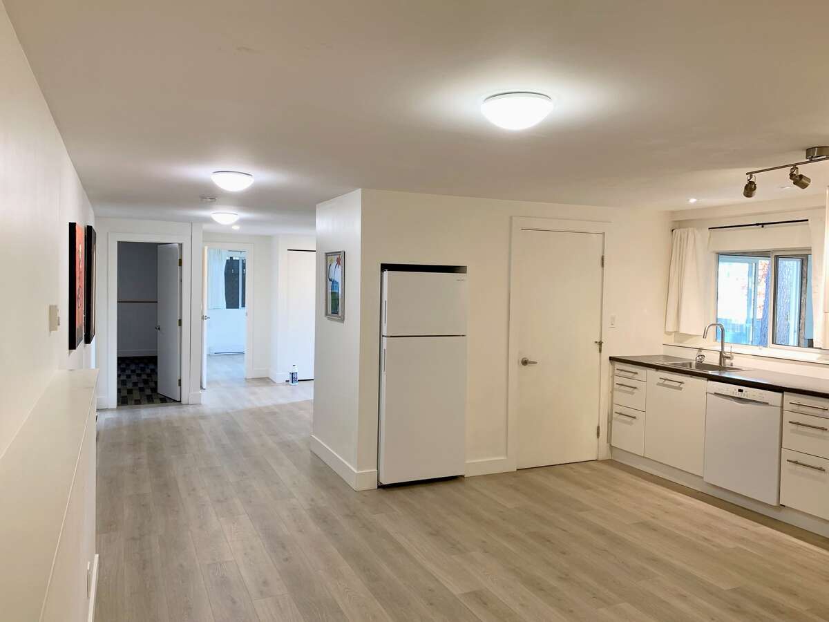 Looking south across lower level great room towards the bedrooms