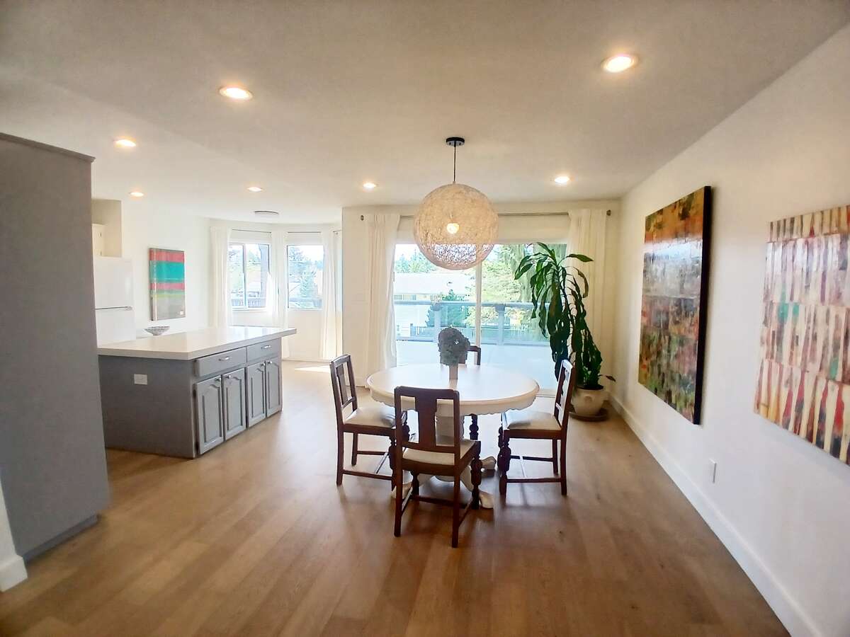 Dining area, kitchen and west-facing deck