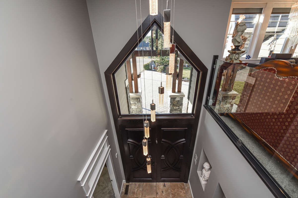 20" Ceiling View From Mezzanine Looking Down to Entrance/Foyer