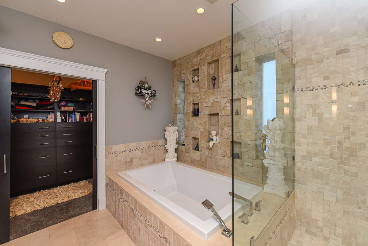 Walk-in Closet Soaker Tub & Shower (separate water closet to the left)