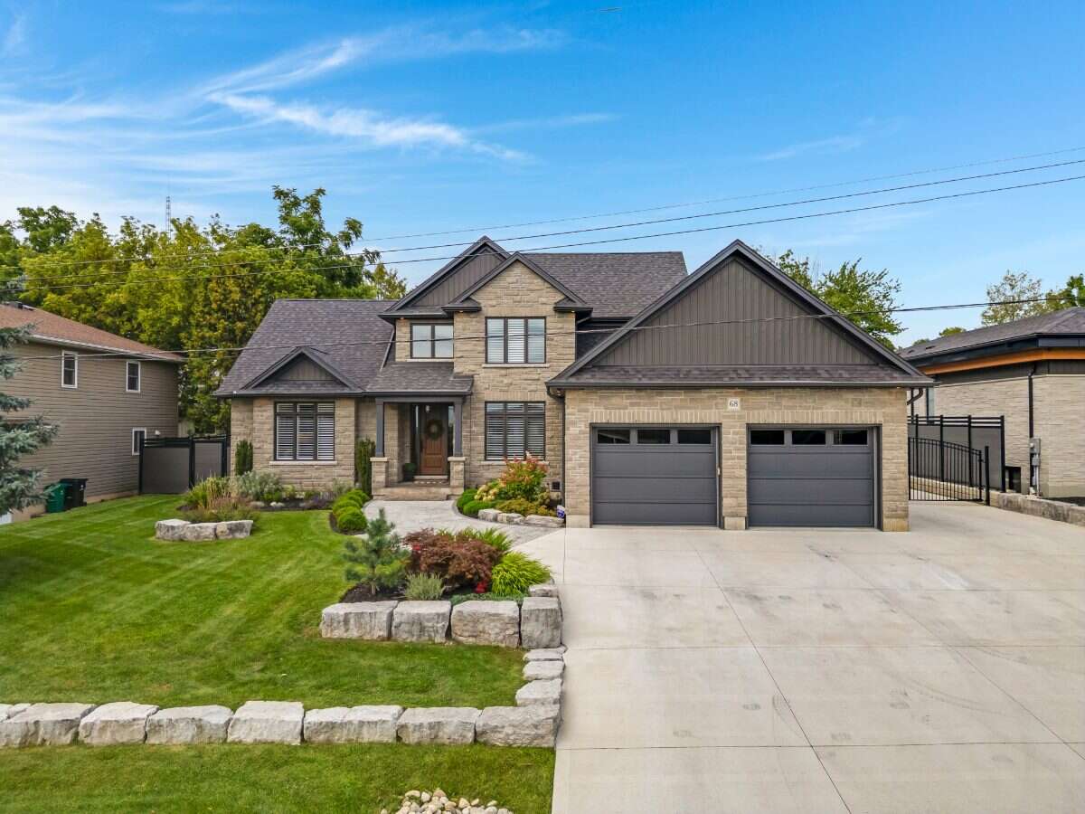 Custom Home. Heated Shop. Quiet lot. Easy Commute