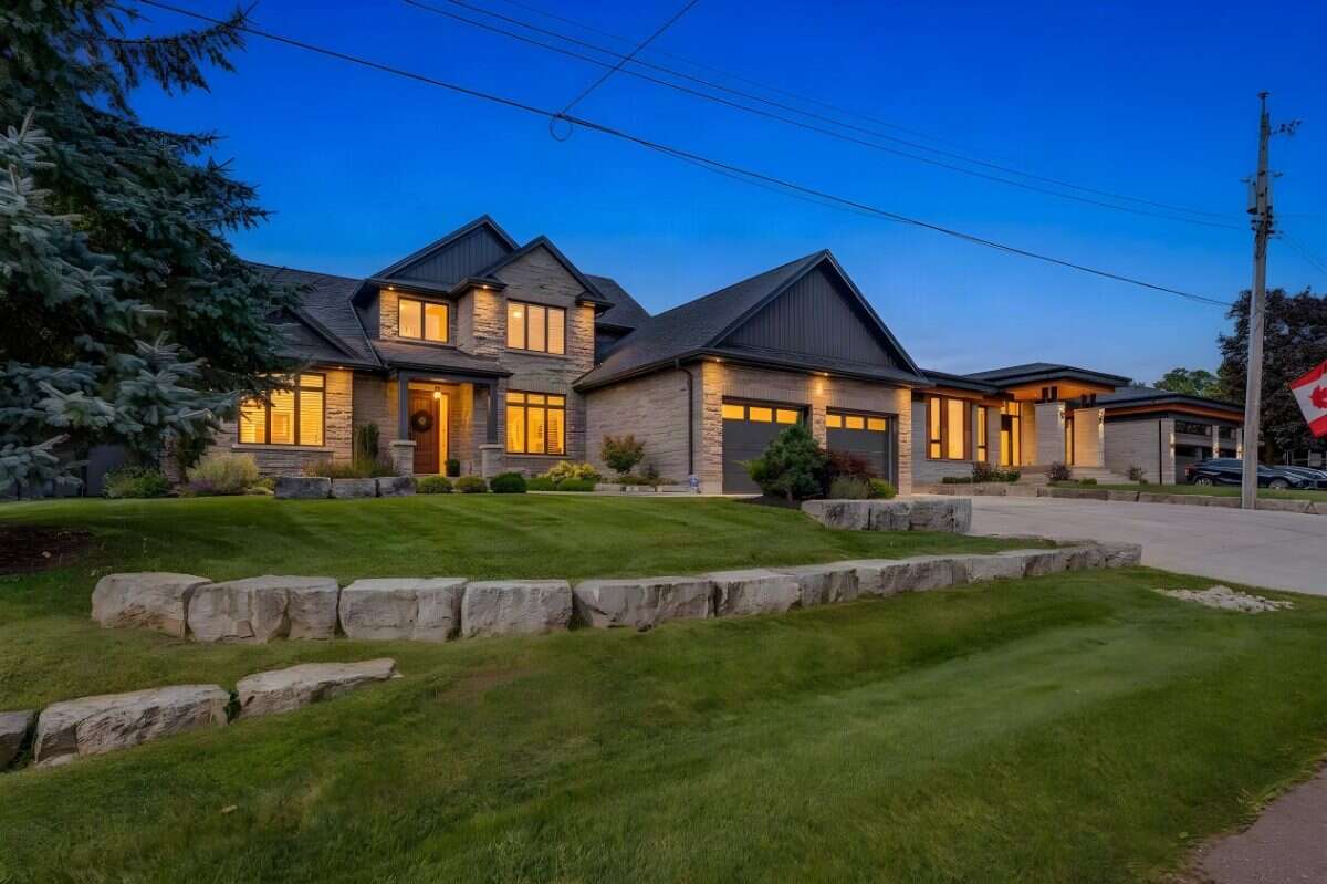 Custom Home. Heated Shop. Quiet lot. Easy Commute