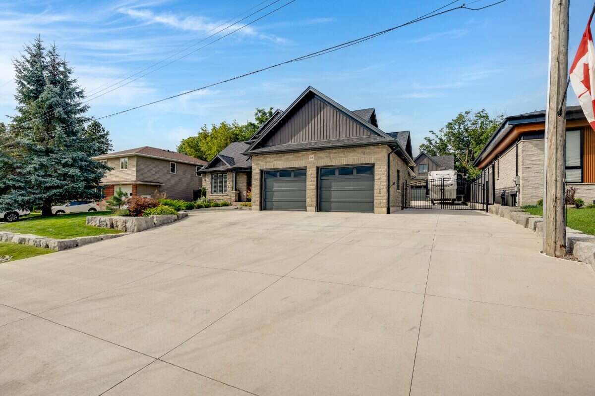 Custom Home. Heated Shop. Quiet lot. Easy Commute