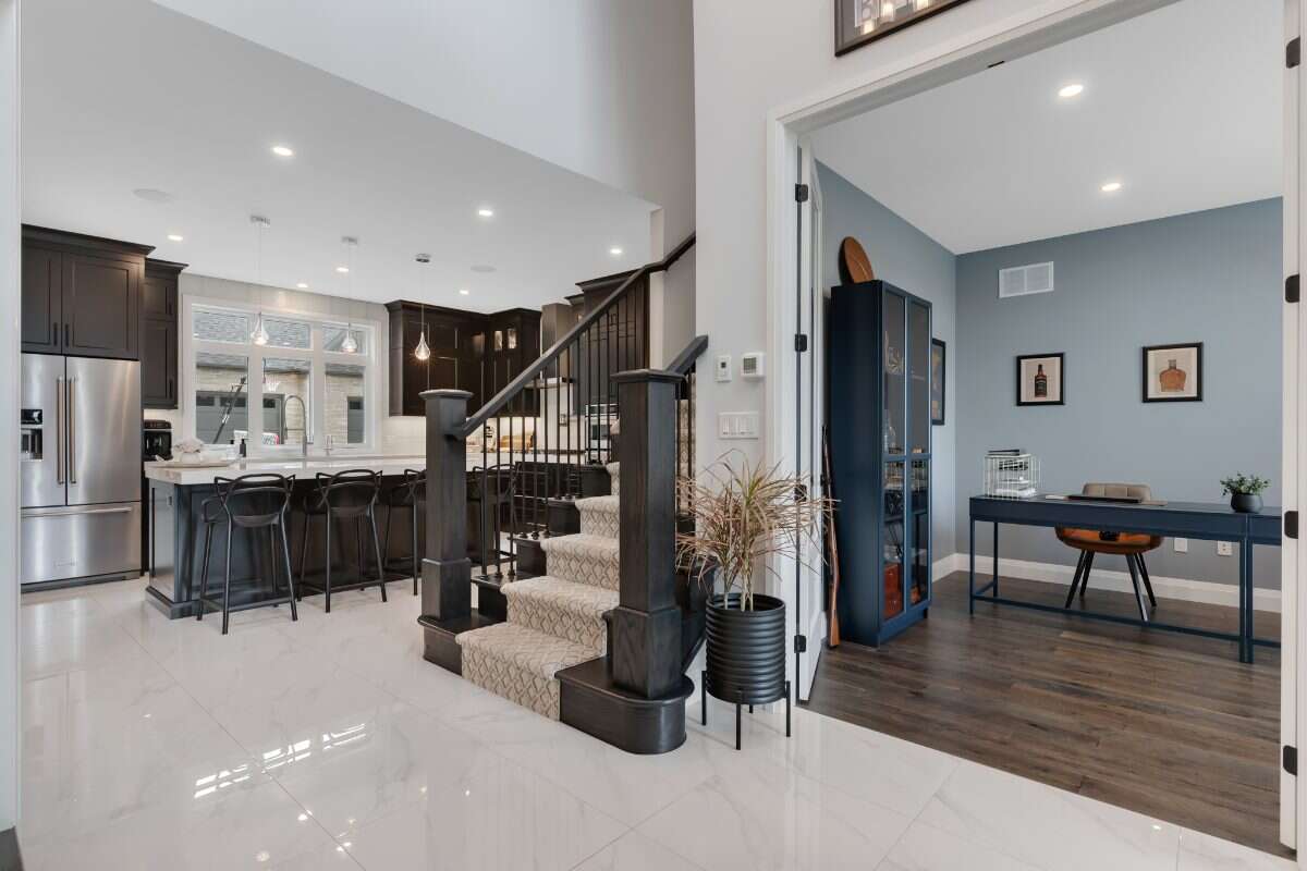 Custom Home. Heated Shop. Quiet lot. Easy Commute