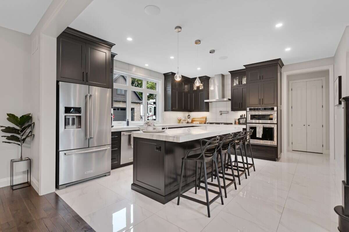 Custom Home. Heated Shop. Quiet lot. Easy Commute