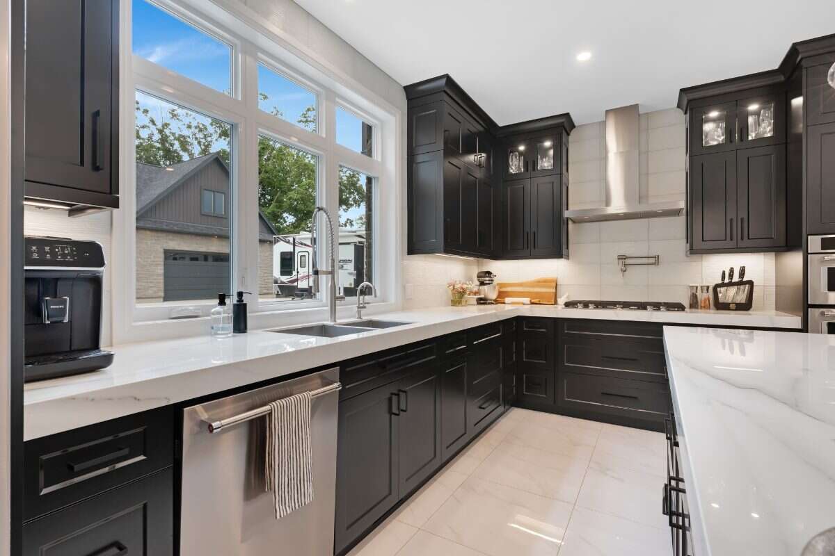 Custom Home. Heated Shop. Quiet lot. Easy Commute