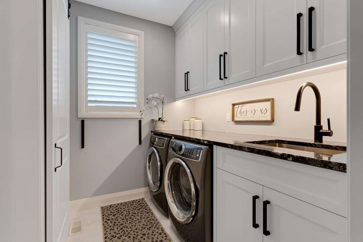 Custom Home. Heated Shop. Quiet lot. Easy Commute