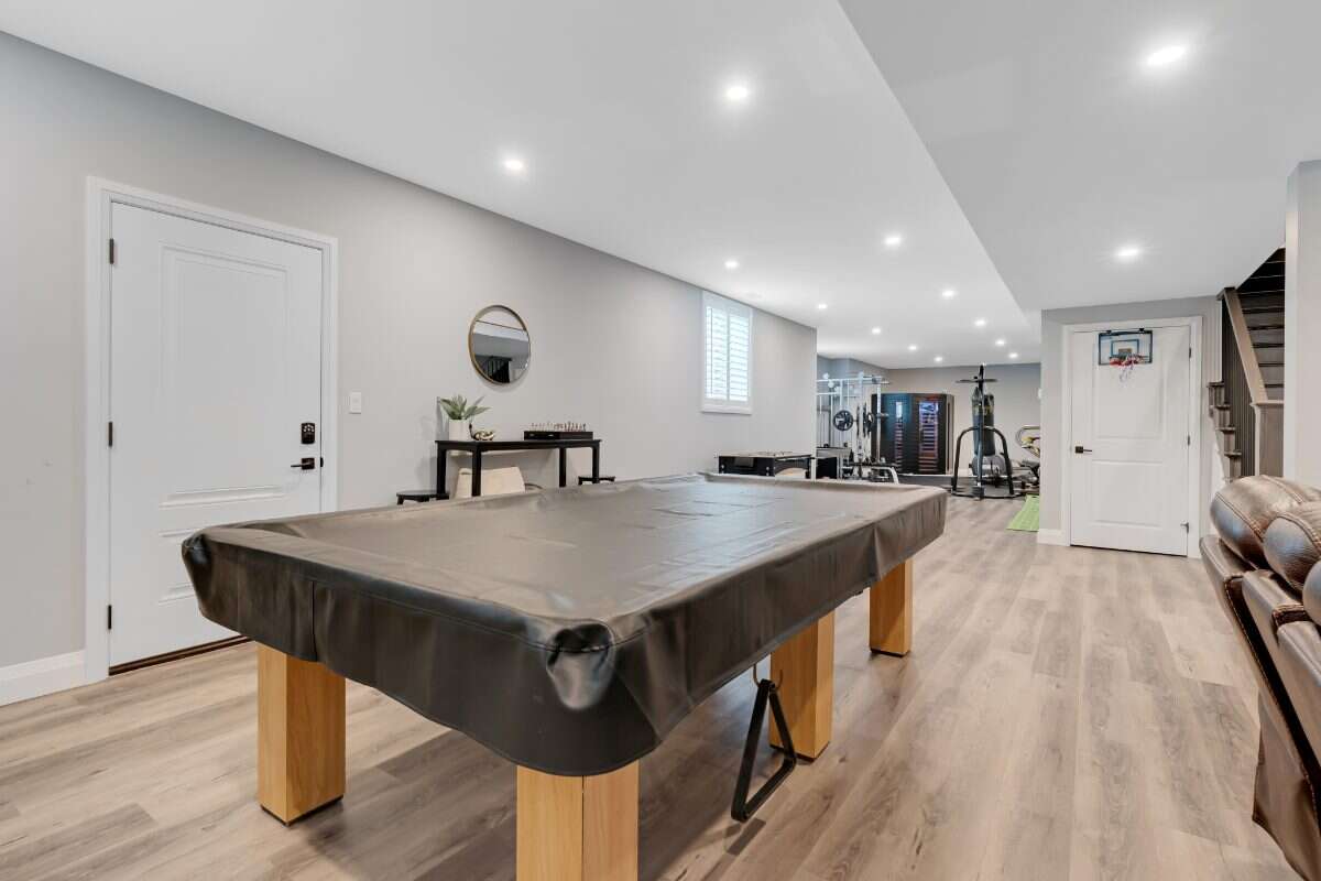 Custom Home. Heated Shop. Quiet lot. Easy Commute