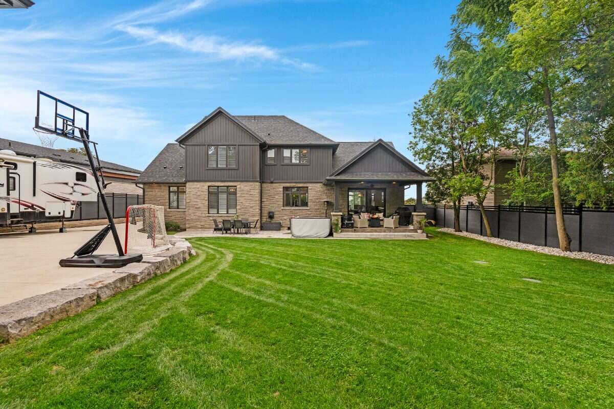 Custom Home. Heated Shop. Quiet lot. Easy Commute