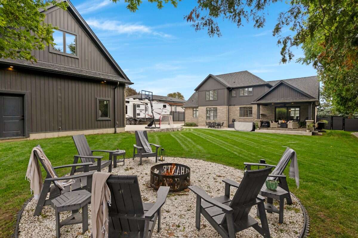 Custom Home. Heated Shop. Quiet lot. Easy Commute